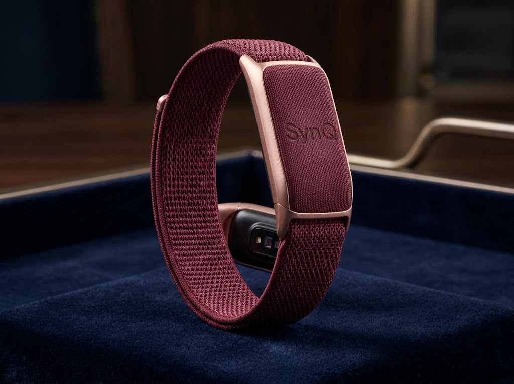 SynQ sleep tracker band in Burgundy with a rose gold frame